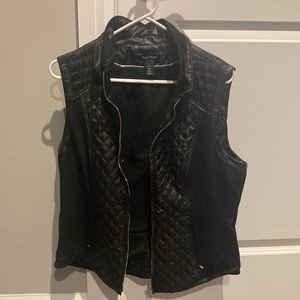 Women’s black zip up vest
